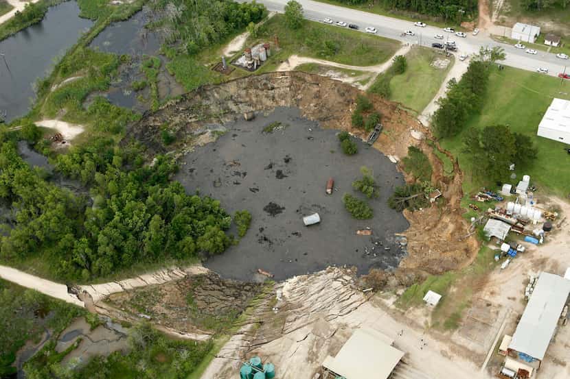 A massive sinkhole near Daisetta, pictured in May 2008, is growing again. The sinkhole...