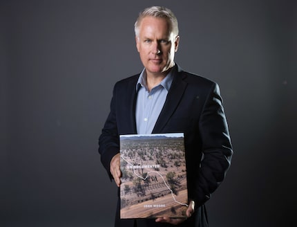 John Moore, with his book Undocumented    