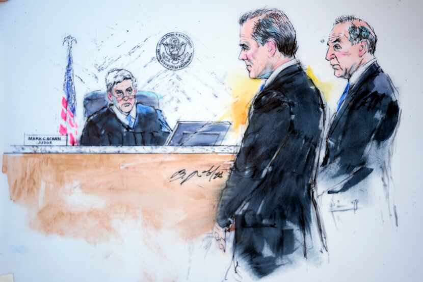 In a courtroom sketch, President Joe Biden's son Hunter Biden (center) appears with attorney...