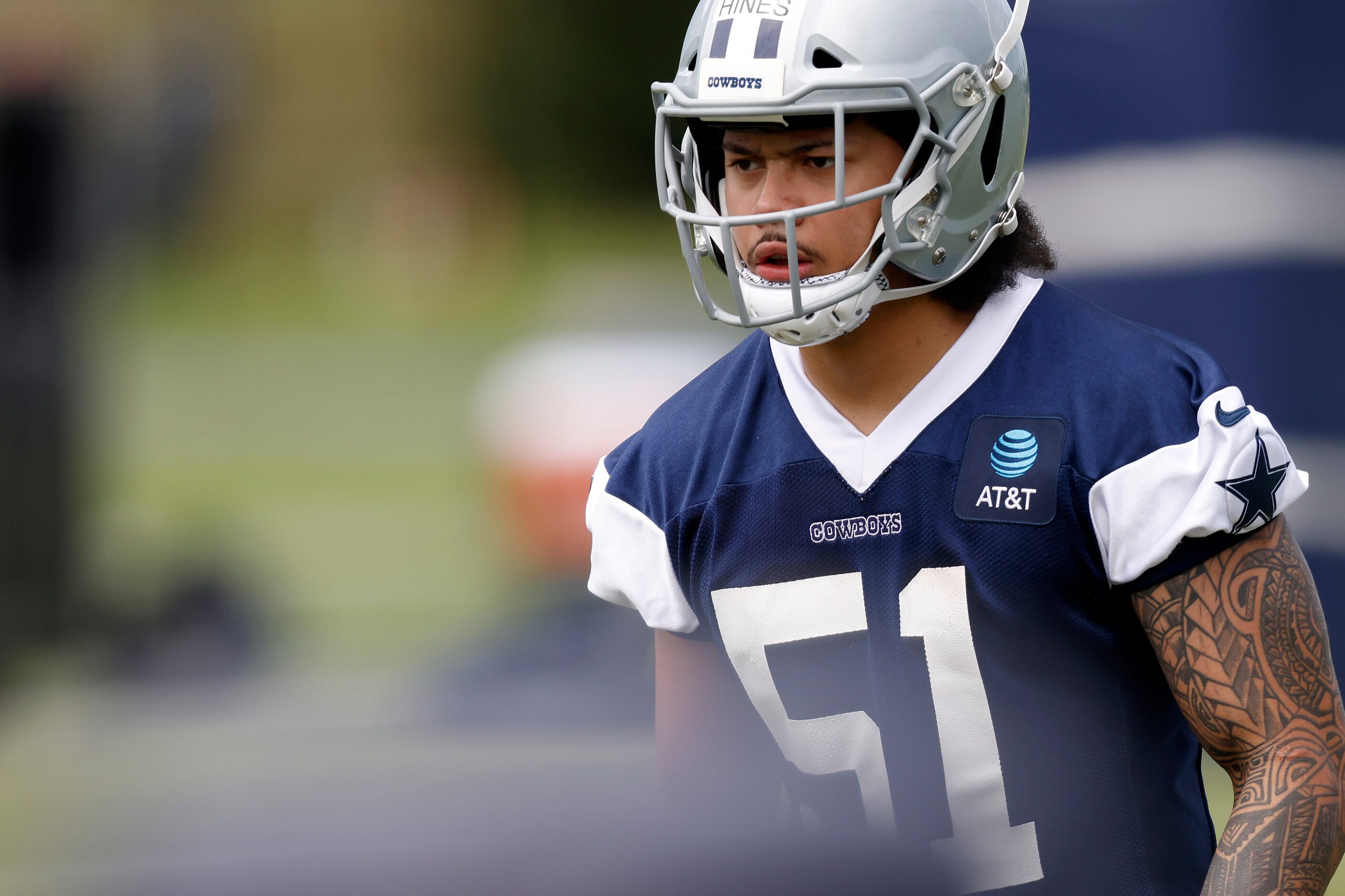 Dallas Cowboys linebacker Anthony Hines (51) lines up for a drill during rookie minicamp at...