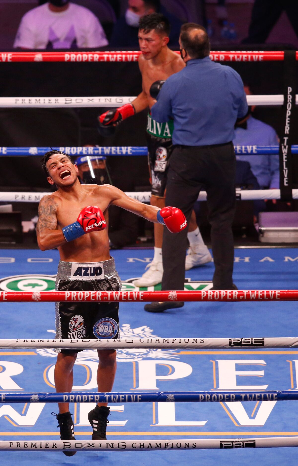 Eduardo Ramirez celebrates after knocking out Miguel Flores during the fifth round at AT&T...