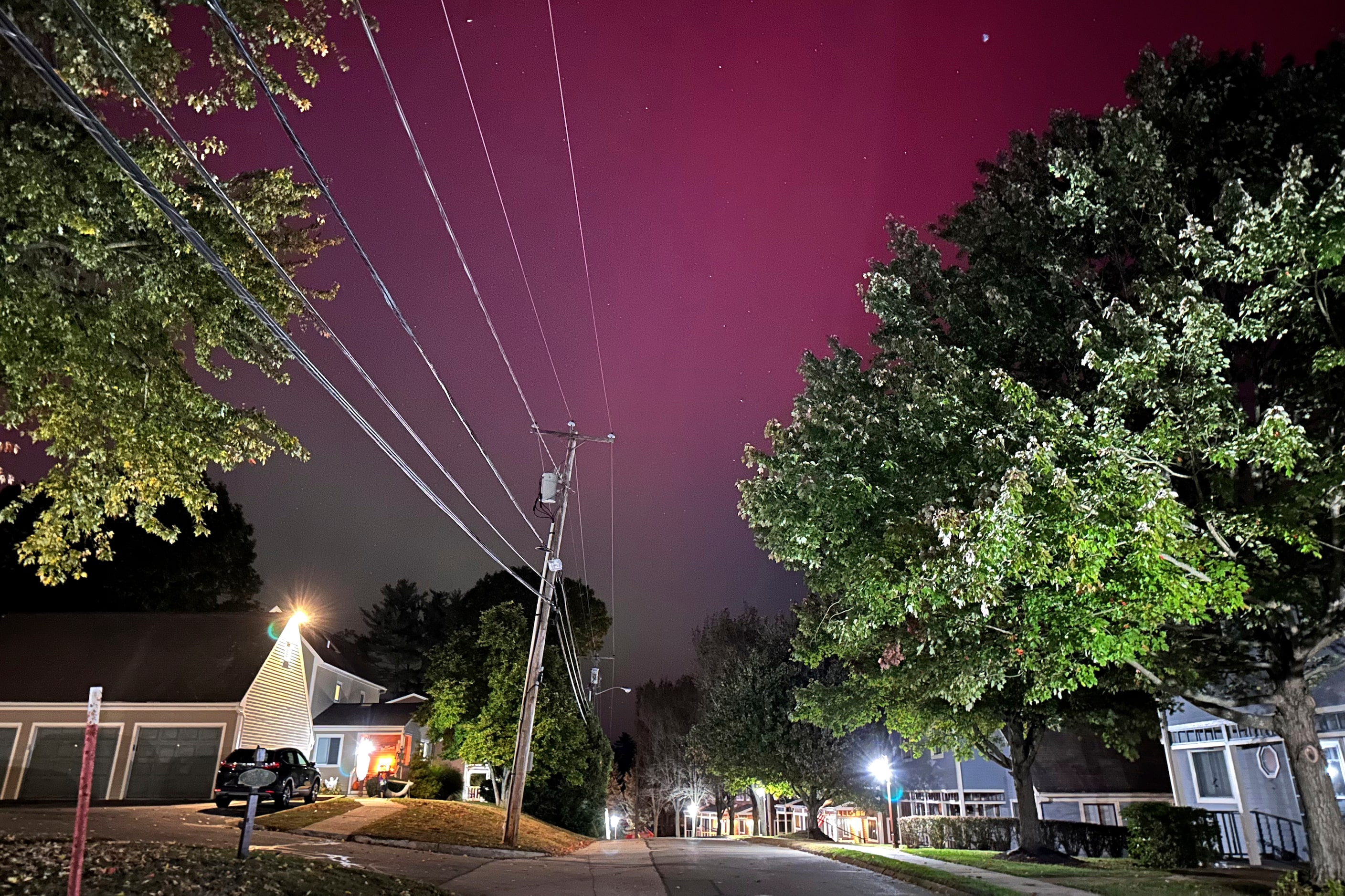 An aurora borealis, also known as the northern lights, shines over Portsmouth, N.H., on...