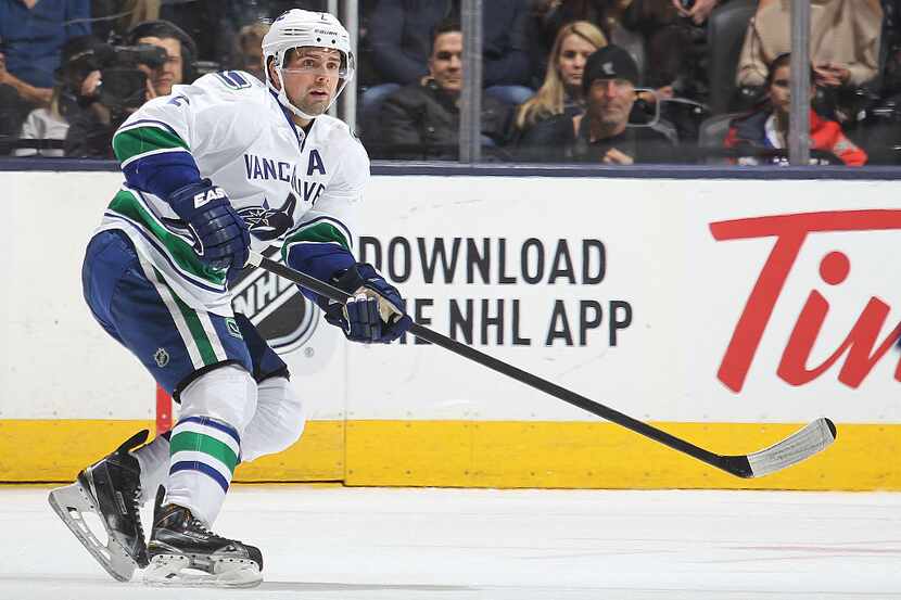 TORONTO, ON - NOVEMBER 14:  Dan Hamhuis #2 of the Vancouver Canucks skates against the...