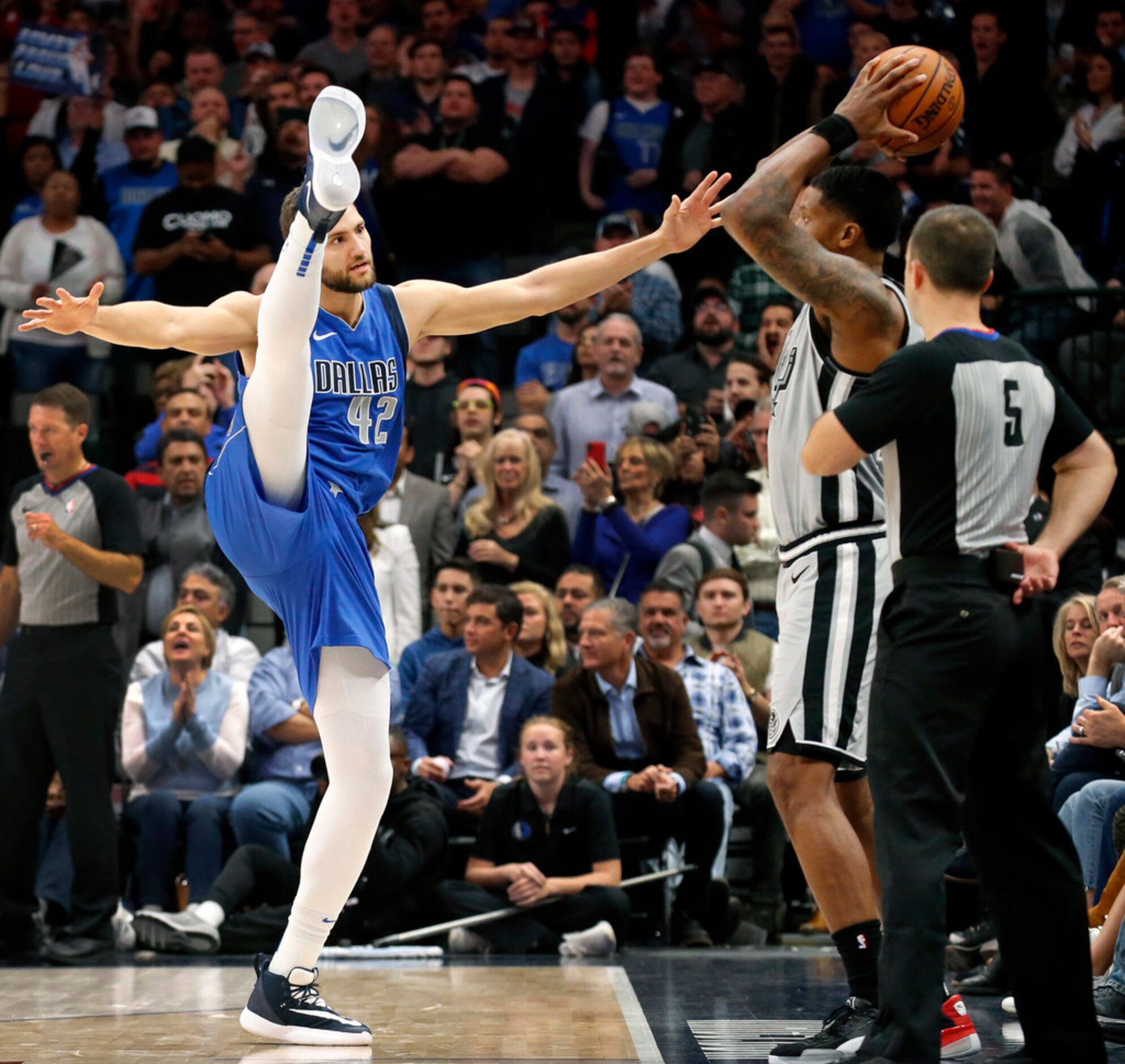 Dallas Mavericks forward Maxi Kleber (42) tries to keep San Antonio Spurs forward Rudy Gay...