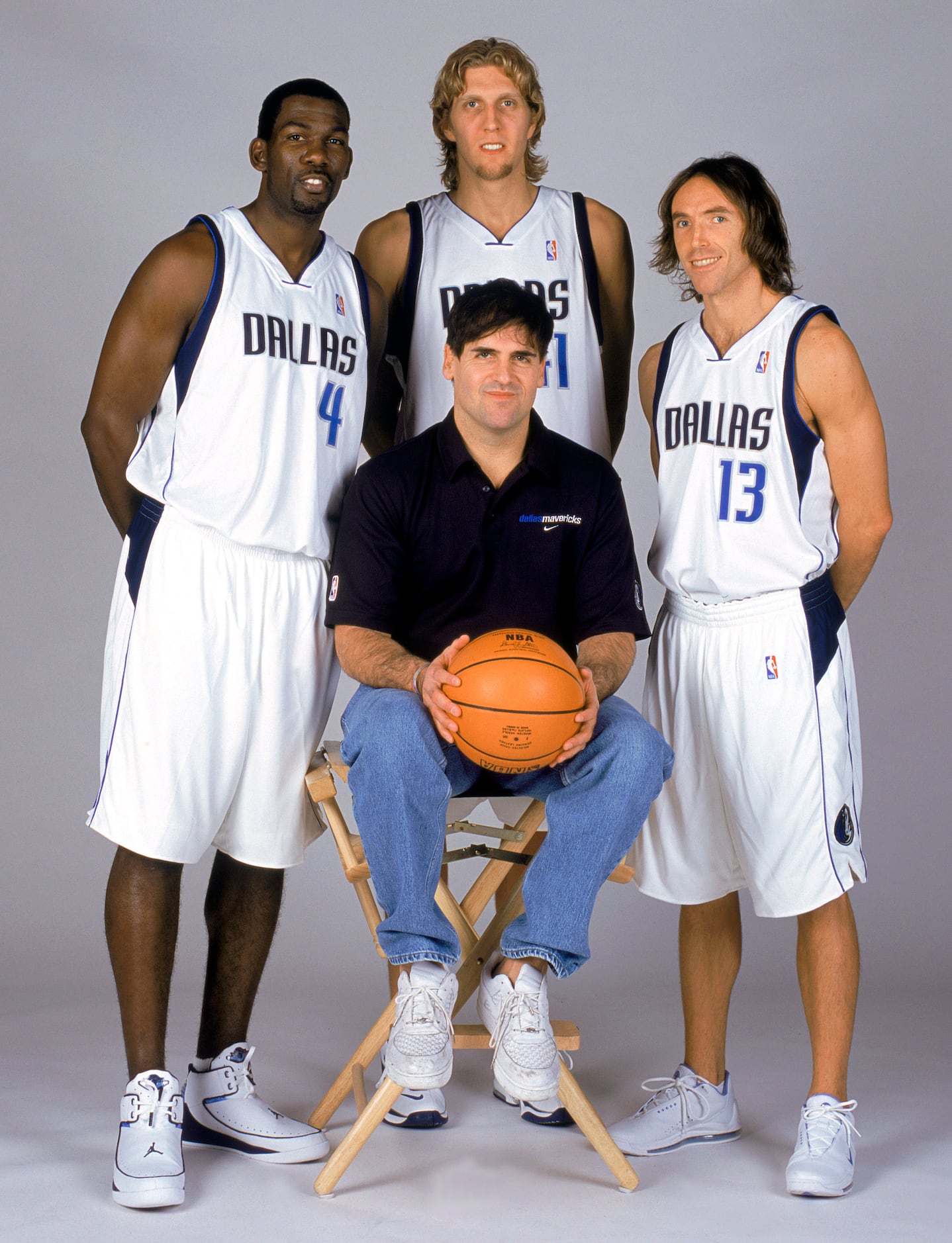 September 30, 2003: Michael Finley (4), Dirk Nowitzki (41), Steve Nash (13) and owner Mark...
