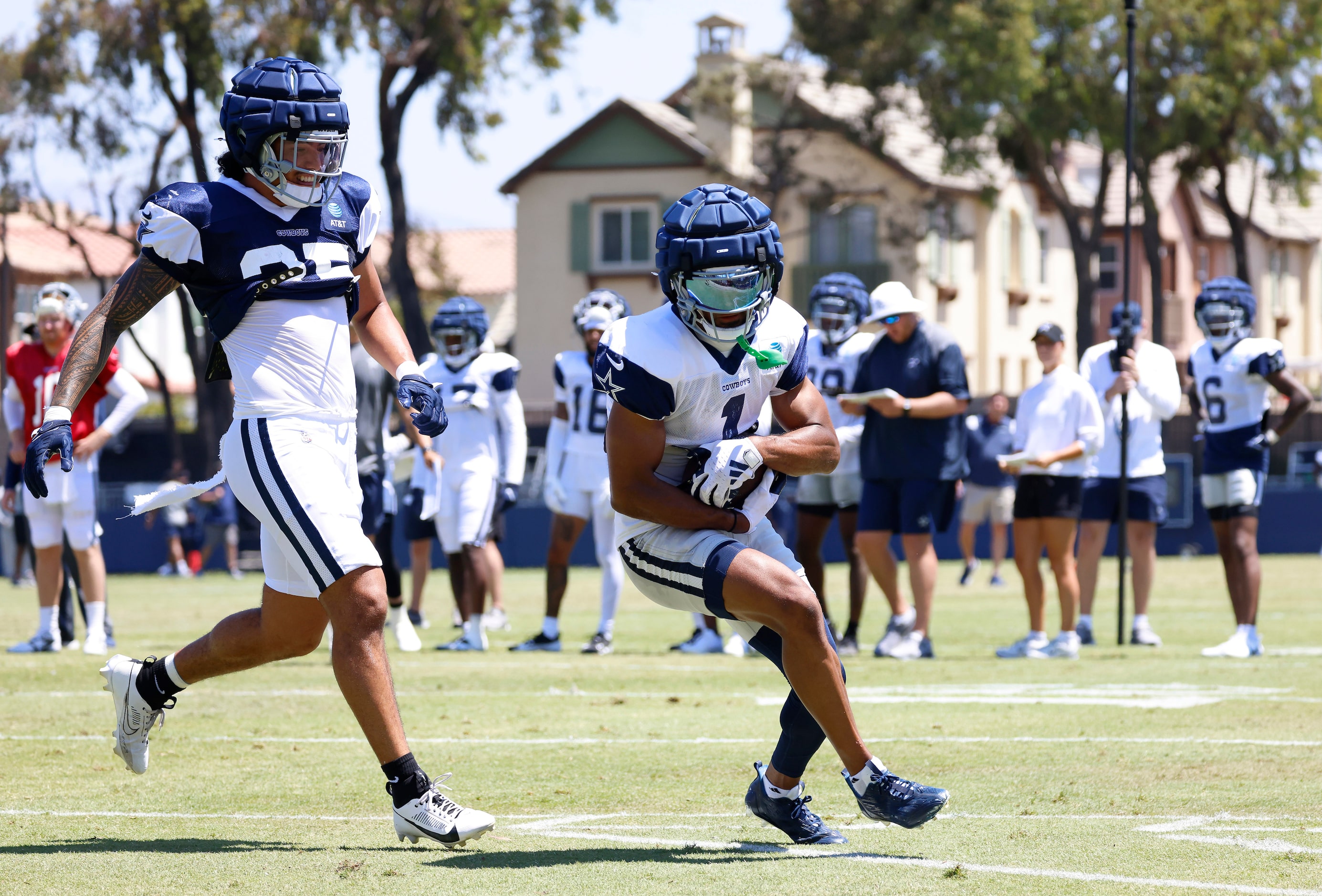 Dallas Cowboys wide receiver Jalen Tolbert (1) catches a pass as he’s covered by linebacker...