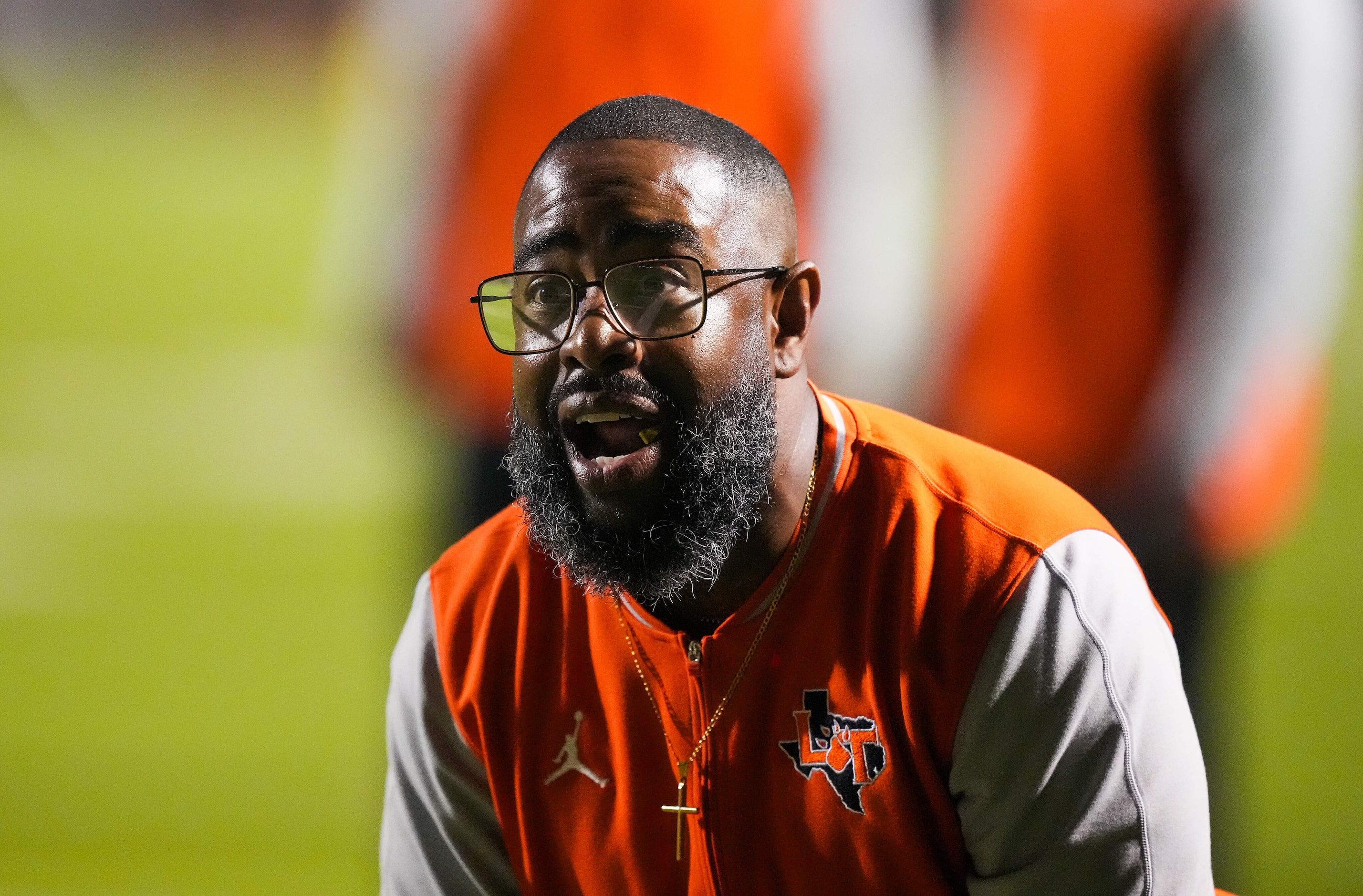 Lancaster head coach Leon Paul reacts to a call during the second half of a District 11-6A...