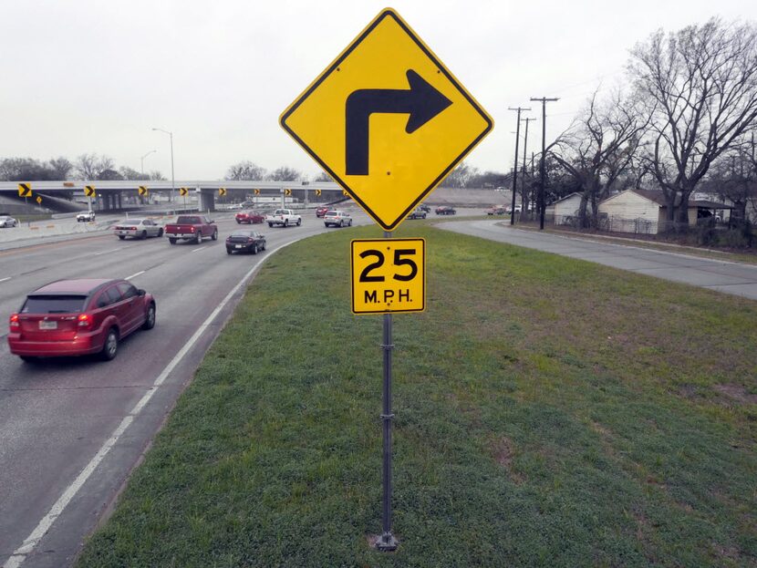 Morning rush hour traffic approaches "Dead Man's Curve" on westbound 175 as traffic merges...