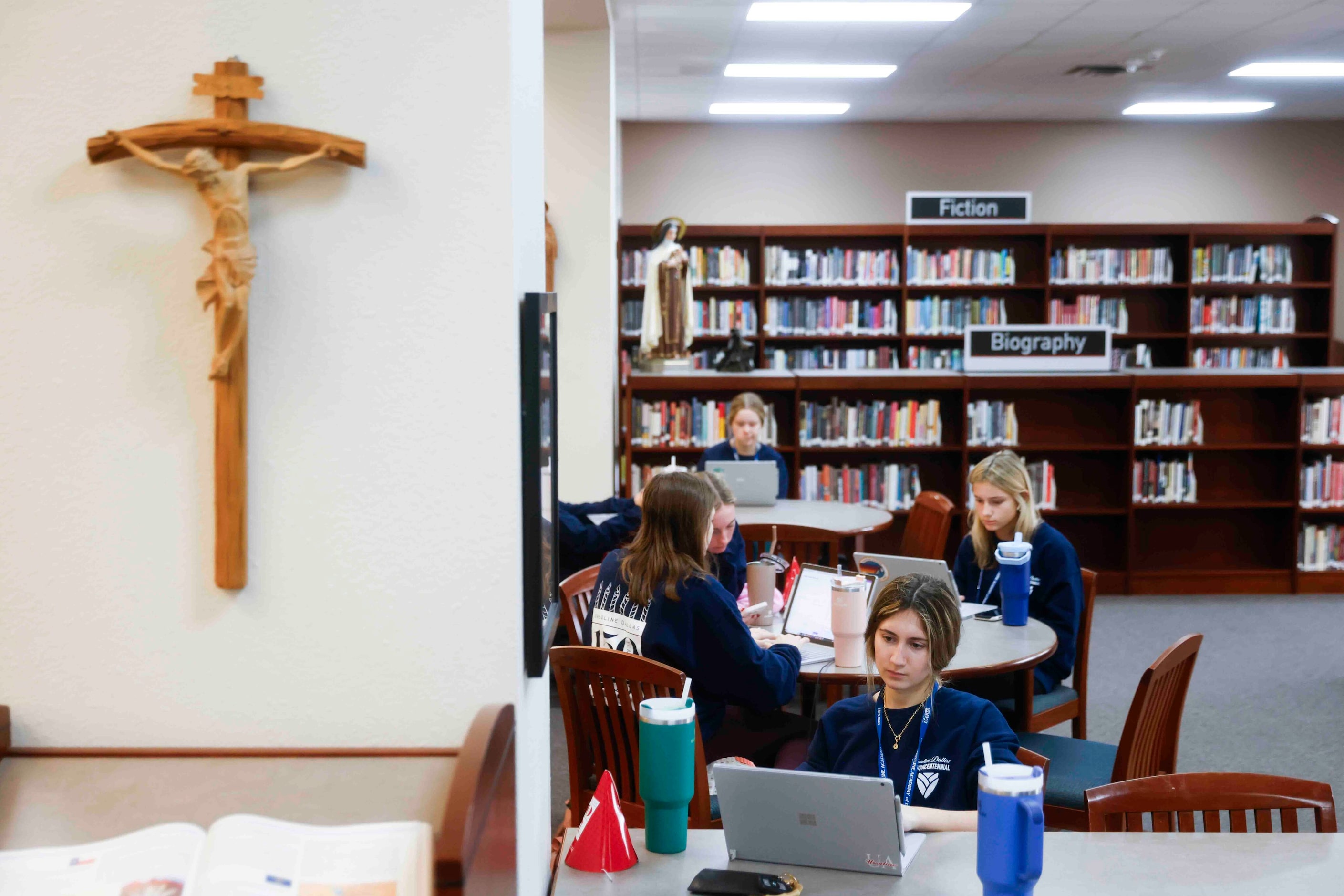 Students work on their computer at the library of Ursuline Academy of Dallas on, Friday,...