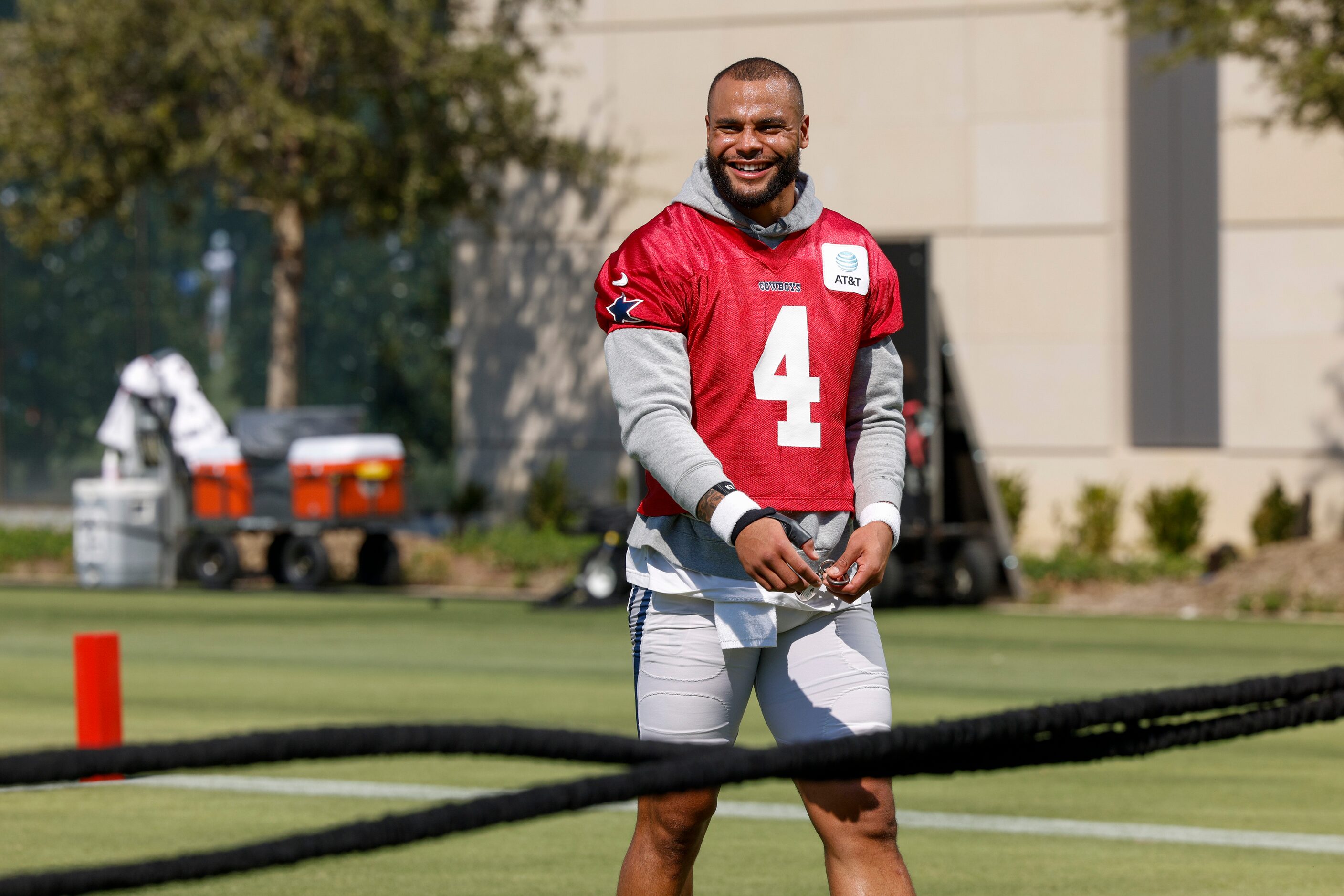 Dallas Cowboys quarterback Dak Prescott (4) talks with wide receiver CeeDee Lamb (88) during...