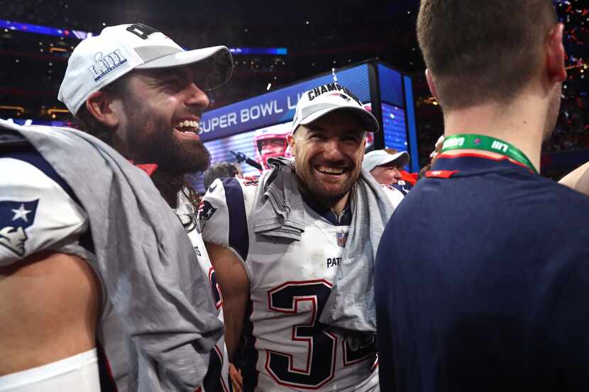 ATLANTA, GEORGIA - FEBRUARY 03:  Rex Burkhead #34 of the New England Patriots celebrates his...