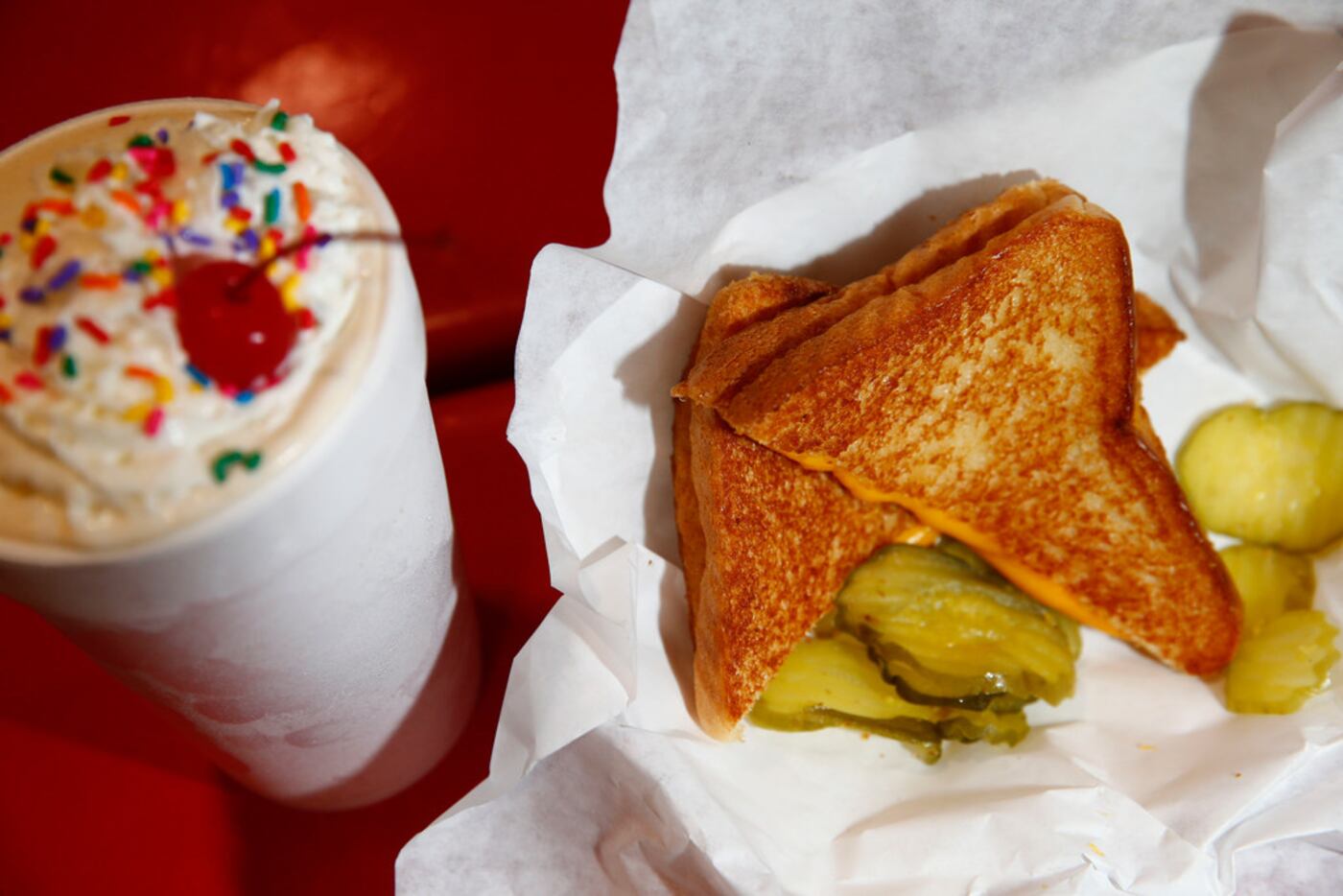 A grilled cheese and a milkshake served at Highland Park Soda Fountain
