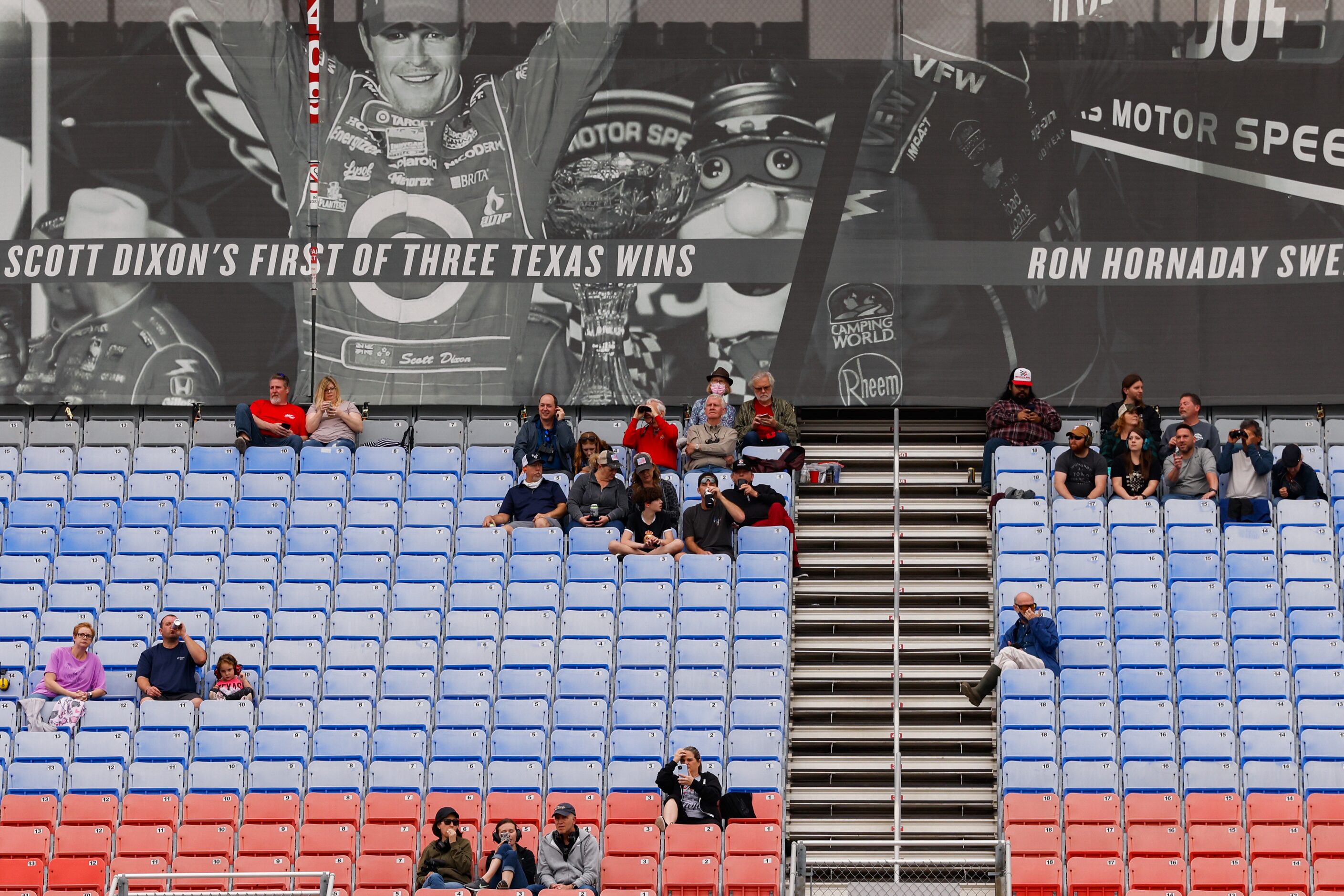 Fans watch the IndyCar Genesys 300 race at Texas Motor Speedway on Saturday, May 1, 2021, in...