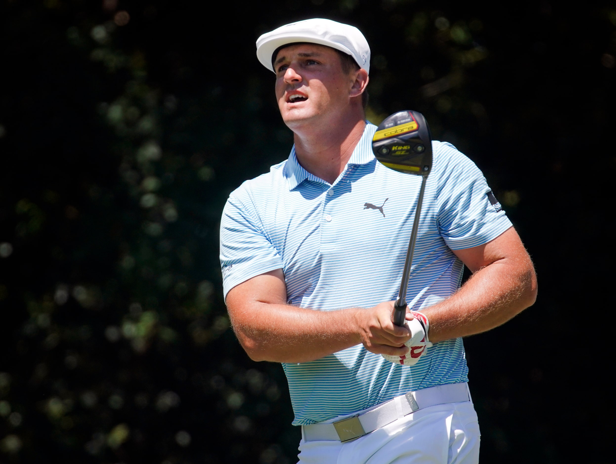 PGA Tour golfer Bryson DeChambeau
watches his drive on No. 12 during the final round of the...