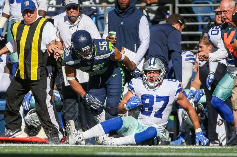 Seattle Seahawks linebacker Mychal Kendricks (56) reacts after tackling Dallas Cowboys tight...