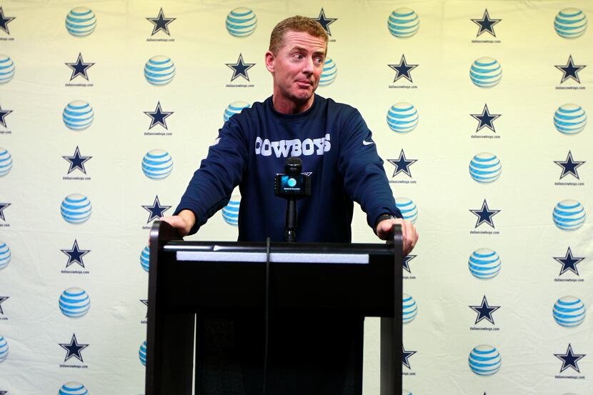 Dallas Cowboys head coach Jason Garrett addresses the media during a news following a...