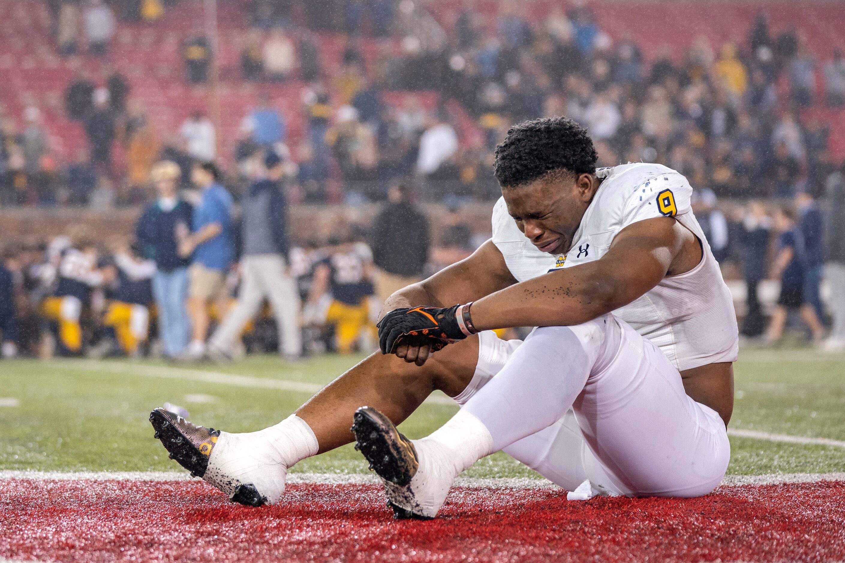 McKinney senior linebacker Jonathan Agumadu (9) cries in dejection after losing 22-21 to...