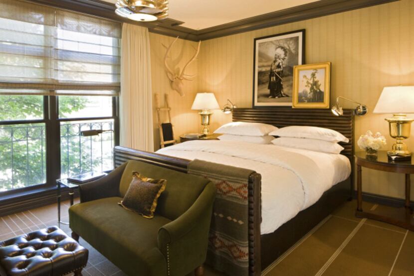 Guest rooms at Hotel Jerome now sport a masculine Western look.  It may look different, but...