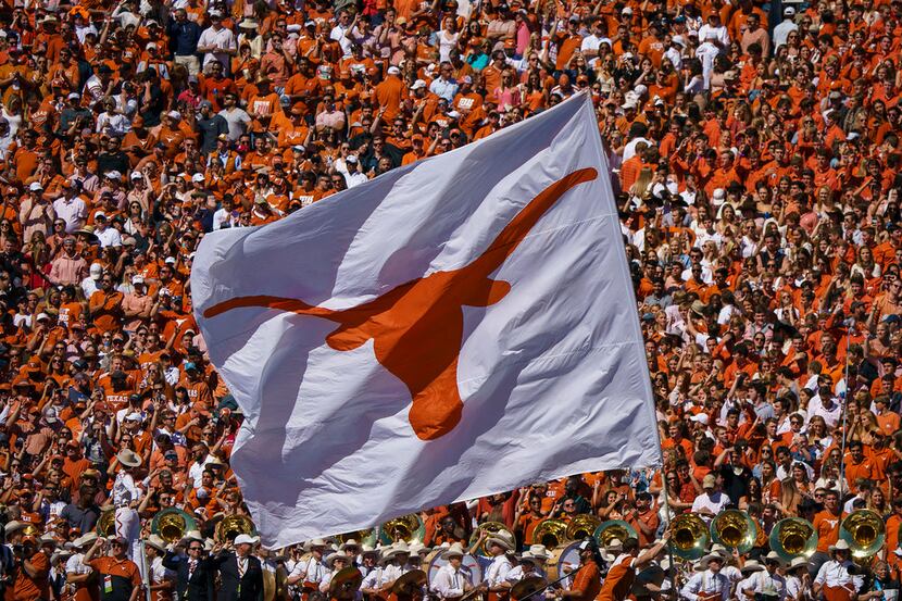 The Texas Longhorns flag is run across the field after a score during the second half of an...