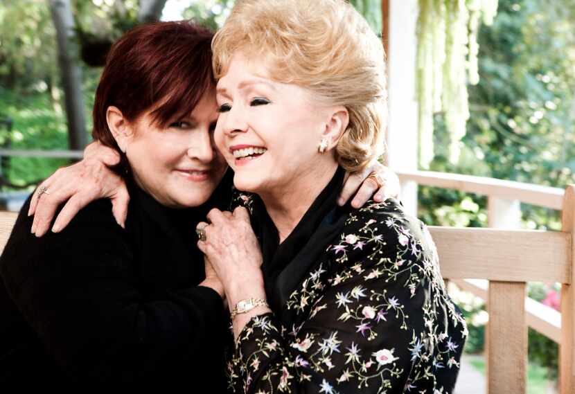 Carrie Fisher and her mother, Debbie Reynolds, at Fisher's home in Beverly Hills, Calif.,...