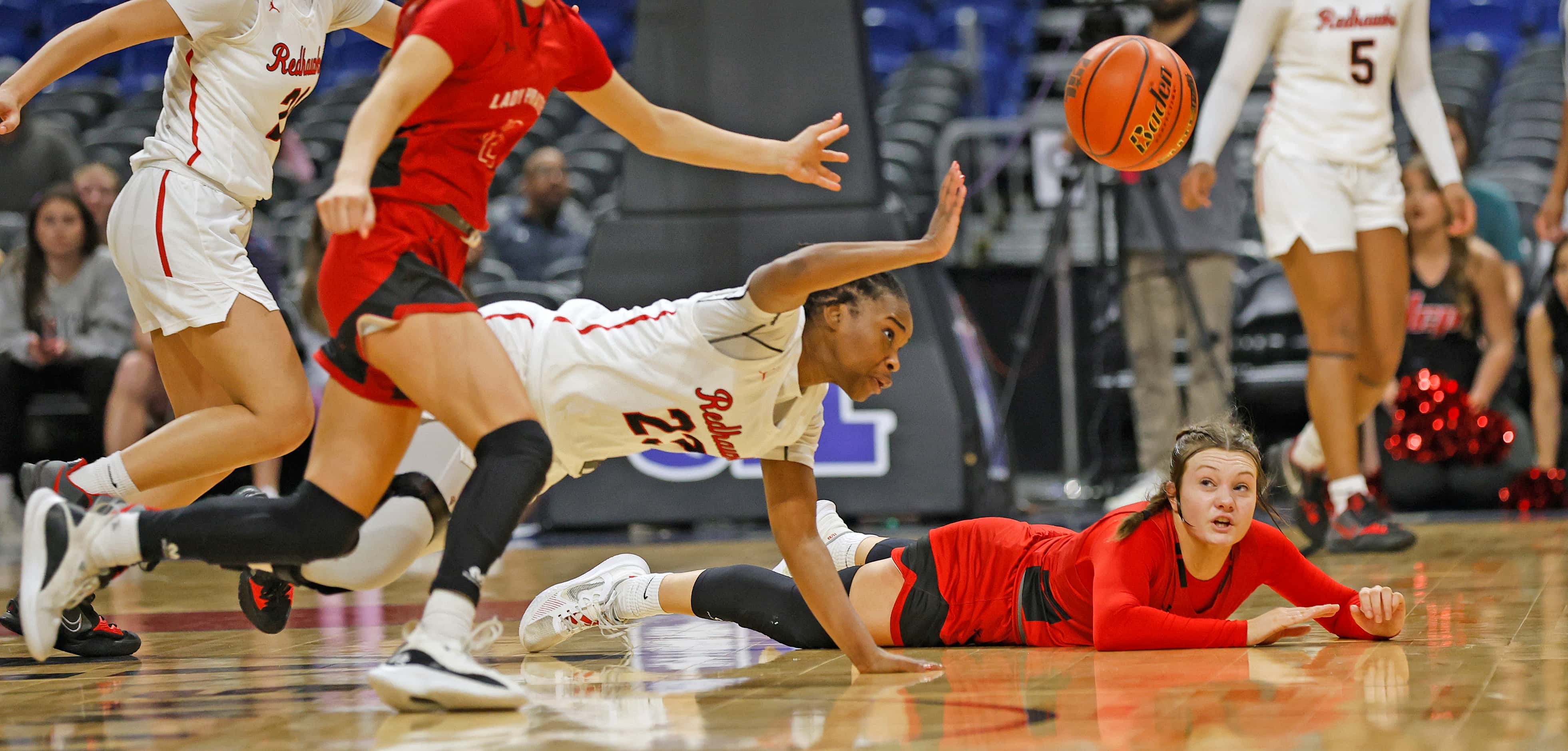 Frisco Liberty Journee Harris (23) dives for a loose ball as Frisco Liberty defeated Lubbock...