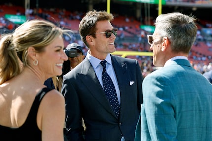 Former NFL player and FOX analyst Tom Brady (center), Erin Andrews and Kevin Burkhardt were...