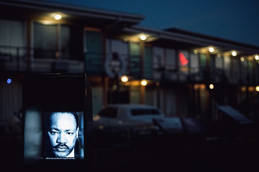 The Rev. Martin Luther King Jr. is visible on a video screen installed in the parking lot of...