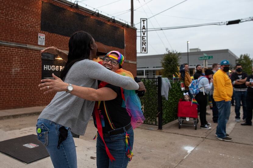 Krista De La Rosa (left) greets Tiffany Algarin as she arrives to a protest outside of...