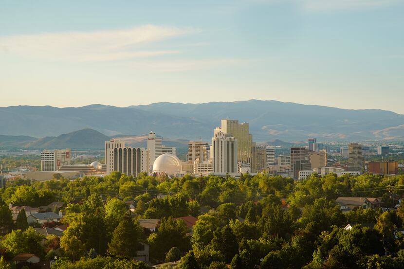 A Reno skyline view of Rancho San Rafael with mountains in the distance.