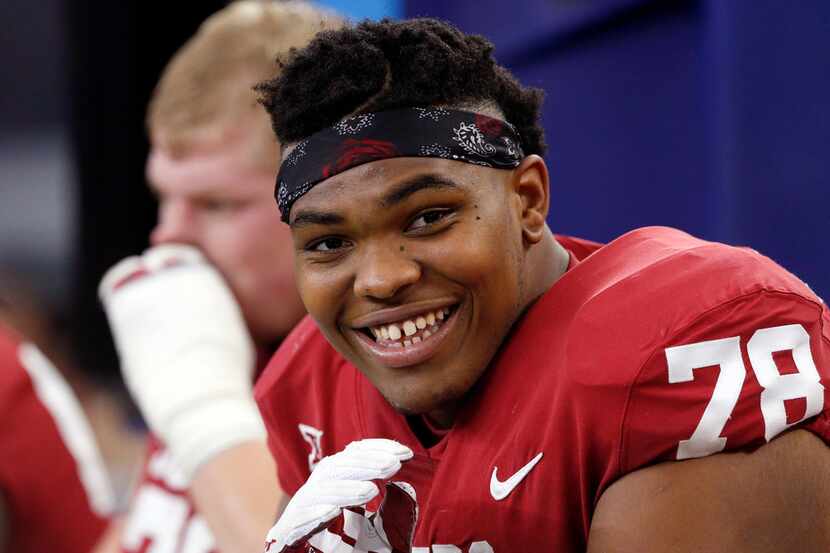 Oklahoma Sooners offensive lineman Orlando Brown (78) smiles on the sideline after the...
