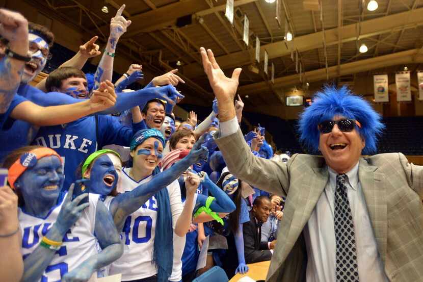 Television personality Dick Vitale greets Duke's Cameron Crazies prior to the start of play...