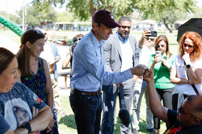 Democratic gubernatorial candidate Beto O'Rourke greets family members of Uvalde mass...