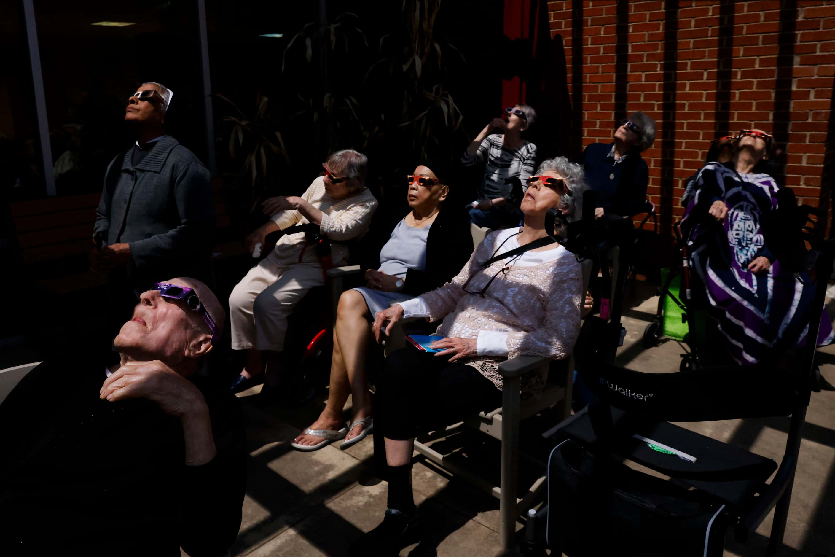 Shadow from the total solar eclipse casts on the residents of St Joseph's Residence Inc. as...