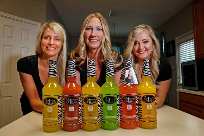 
From left: Summer Lamons, Megan Toole-Hall and Krista LaMothe launched Skimpy Mixers at a...