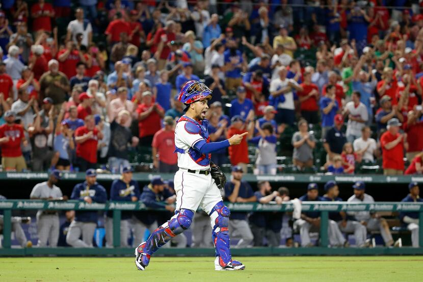 Texas Rangers catcher Robinson Chirinos (61) celebrates a 8-5 win over Milwaukee Brewers at...