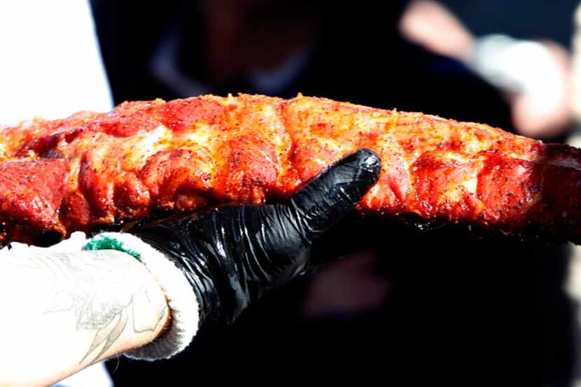 A large portion of brisket glows in the sun as Matt Pittman shares important details at his...