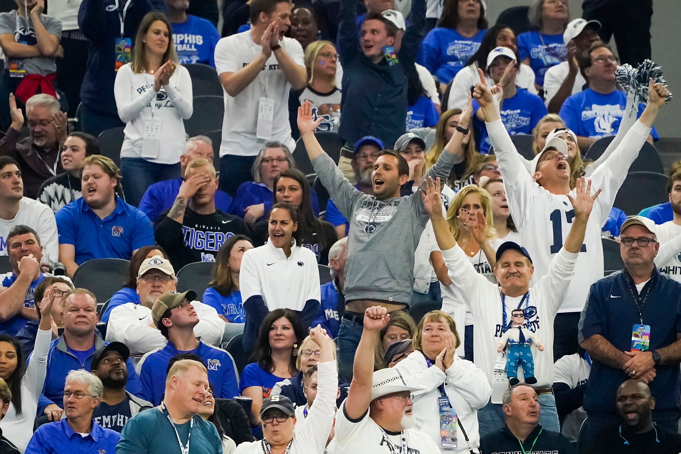 Penn State fans celebrate a touchdown on an interception by safety Garrett Taylor during the...