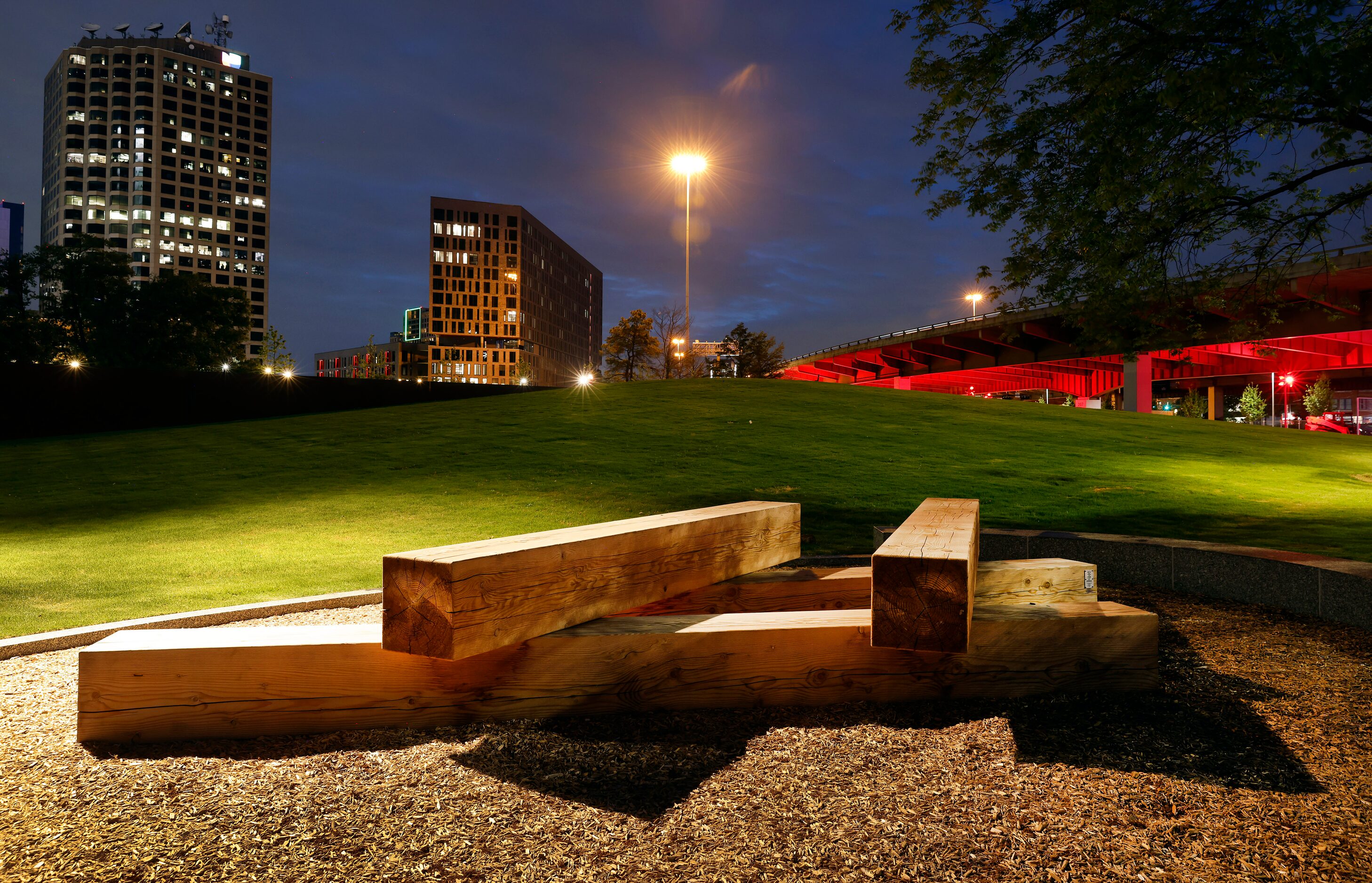 Large cut timbers stacked in the newly constructed Carpenter Park is a play area, April 27,...