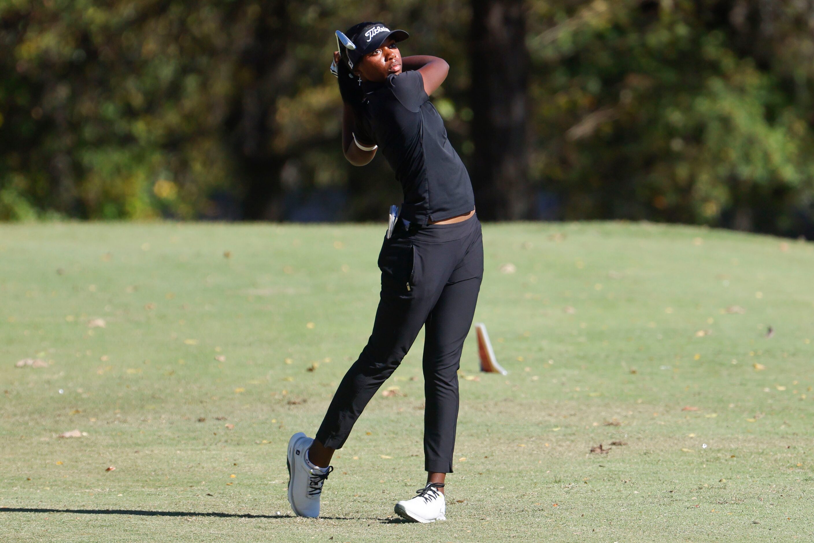 Shyla Brown of McKinney, tees off on the third hole during the Southwest Airlines Showcase...