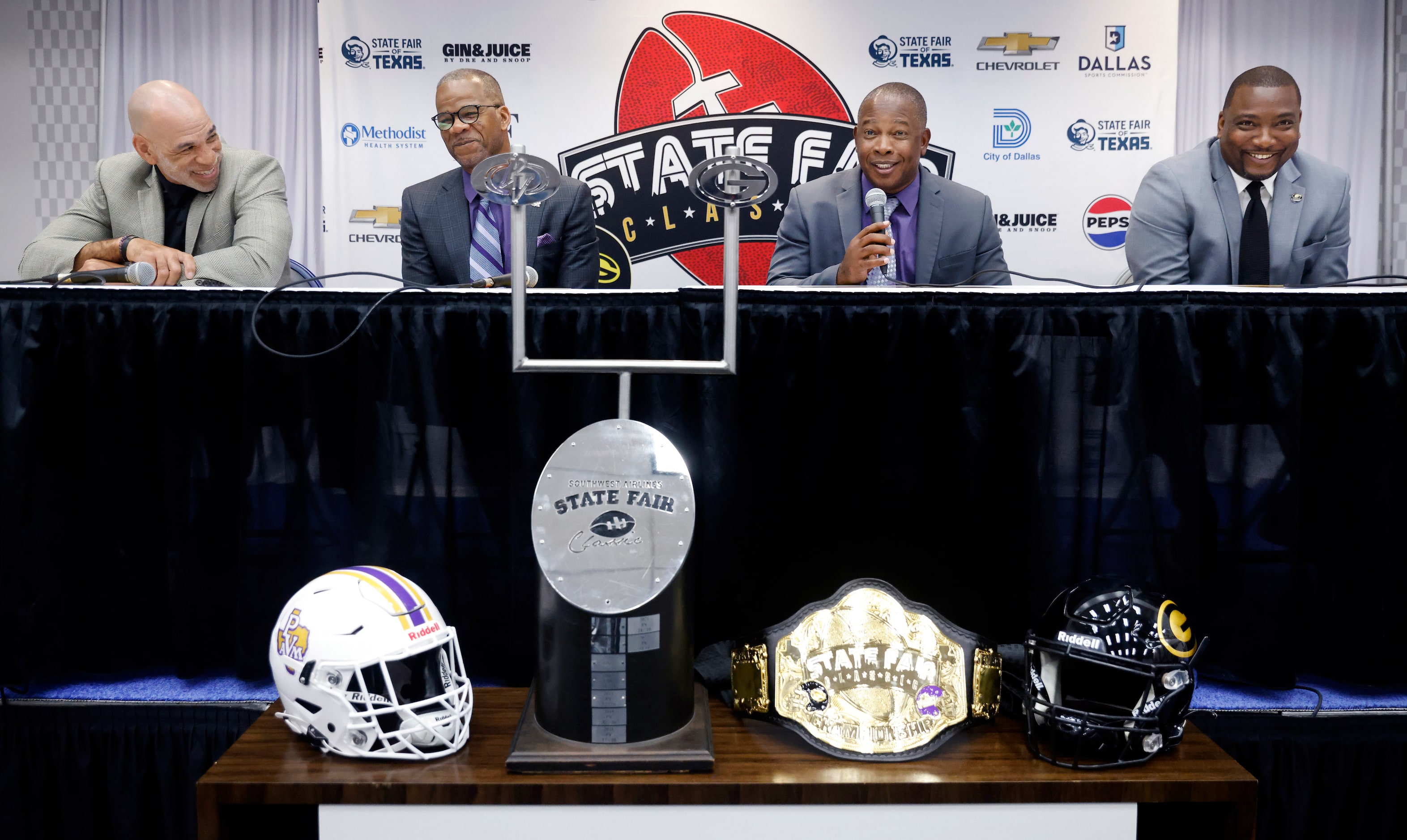 (from left) Prairie View A&M University Director of Athletics Anton Goff and his head...