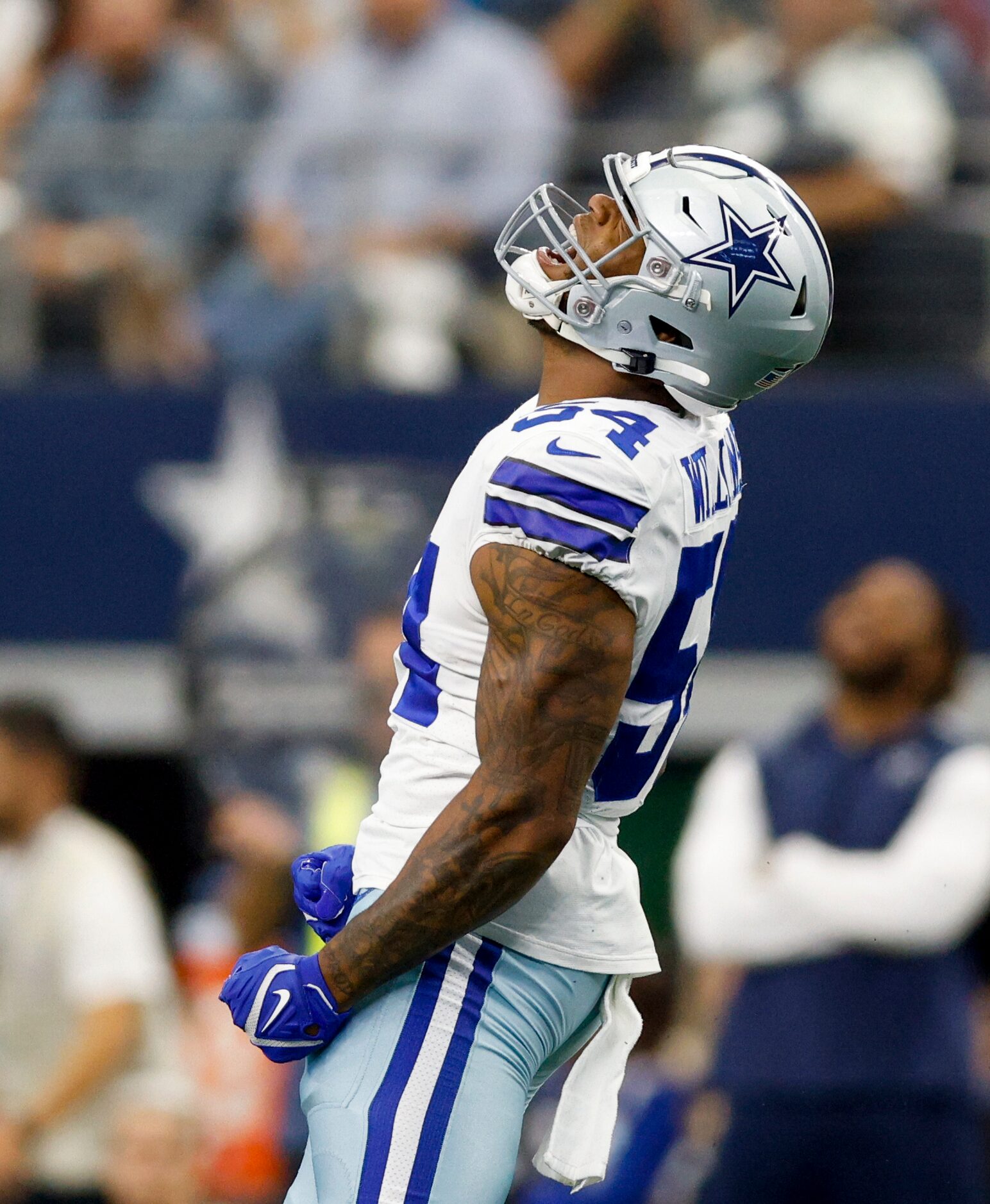 Dallas Cowboys defensive end Sam Williams (54) celebrates a tackle for loss during the...