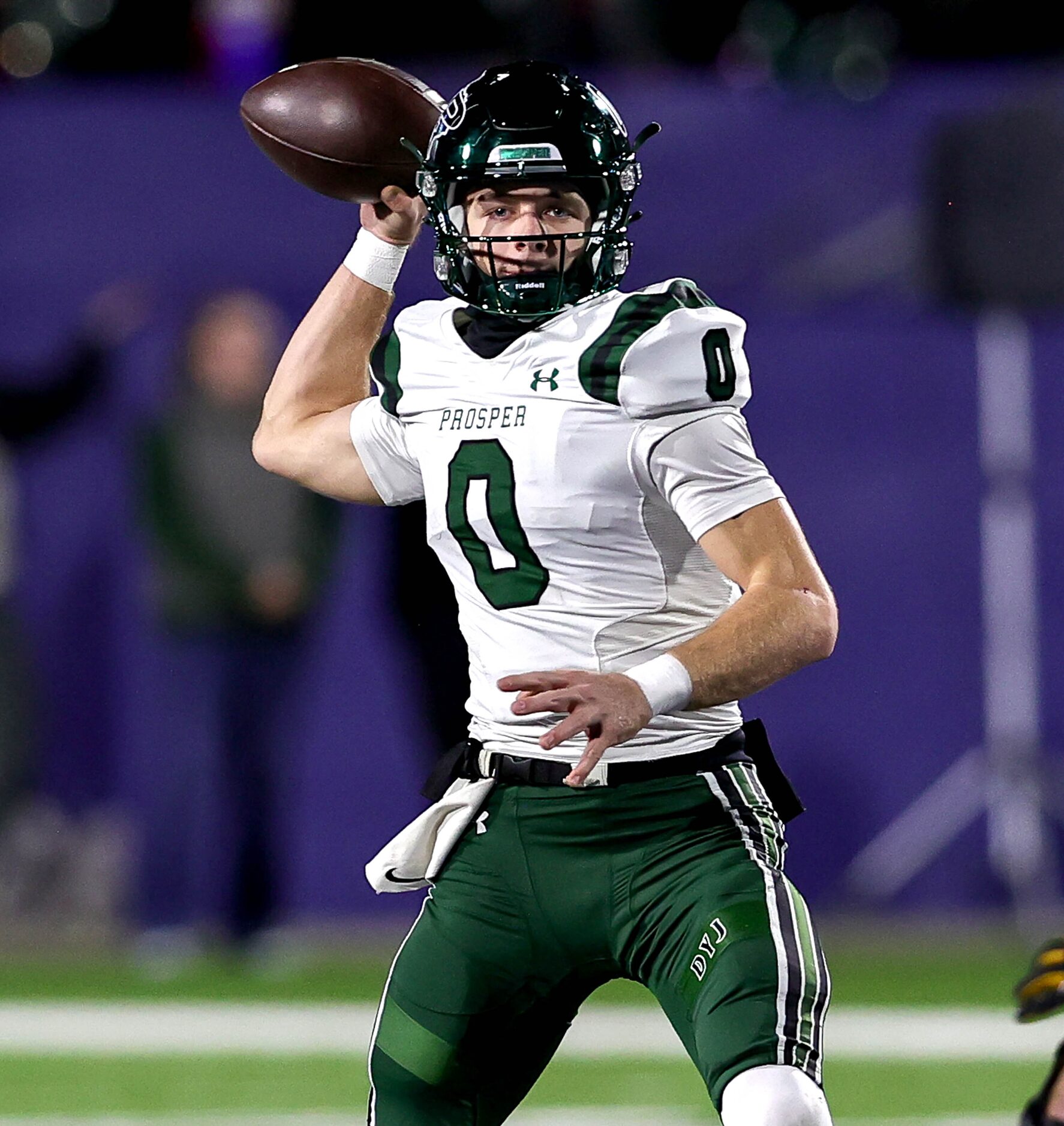 Prosper quarterback Nathan TenBarge looks to make a pass against McKinney during the first...