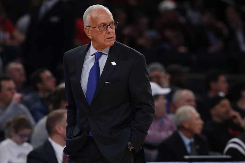 Southern Methodist head coach Larry Brown look on as his team played Minnesota during the...