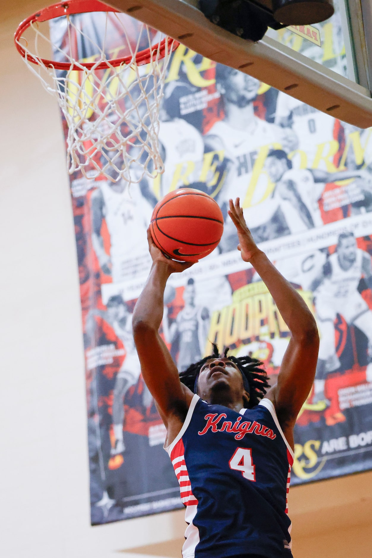 Kimball High’s Da’Marrion Wesley drives to the basket against Centennial High of California...