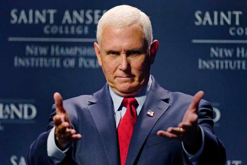 Former Vice President Mike Pence gestures during the "Politics and Eggs" breakfast...