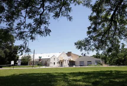 Carden owns 935 E. Clardendon, which is up for rezoning and swathed in large pecan trees....