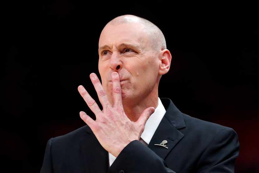 Dallas Mavericks head coach Rick Carlisle reacts during the first half of an NBA basketball...