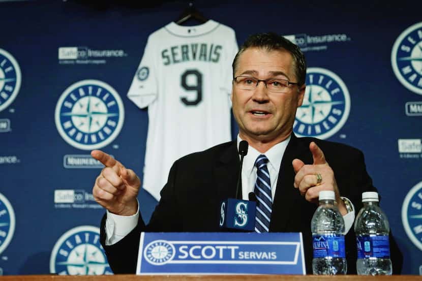 Scott Servais talks to reporters after he was introduced as the new manager of the Seattle...