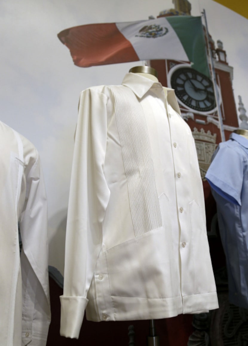 In this Wednesday, Oct. 17, 2012 photo, a guayabera from the 1970s in Mexico worn by...