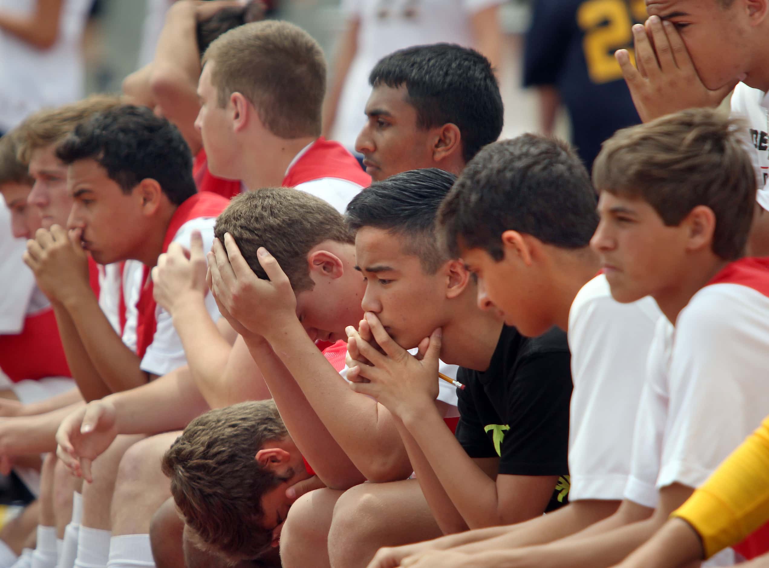 Frisco Liberty players look dejected after their opponent Frisco Wakeland score the game...